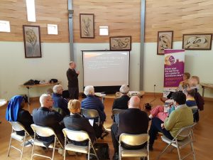 Chris Watkins of Embrace leads a workshop about the project